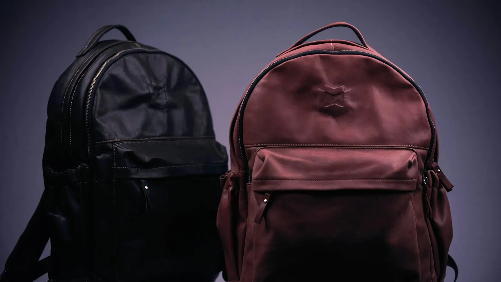 Two backpacks placed side by side